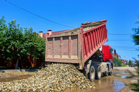 Dump Truck Delivering Rock